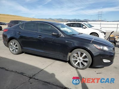 Czwarte zdjęcie samochodu z boku: 2012 KIA OPTIMA SX VIN:5XXGR4A6XCG055279 - miniatura