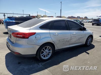 Trzecie zdjęcie samochodu z tyłu: 2016 FORD FOCUS SE VIN:1FADP3F24GL209358 - miniatura