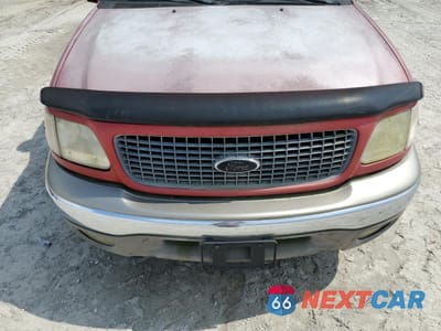 Zdjęcie 12 z 13 samochodu: 2000 FORD EXPEDITION EDDIE BAUER VIN:1FMRU17L0YLB87828 - miniatura