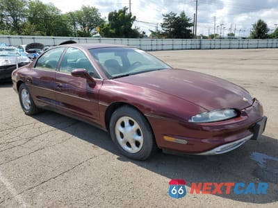 Czwarte zdjęcie samochodu z boku: 1999 OLDSMOBILE AURORA VIN:1G3GR62C0X4117191 - miniatura
