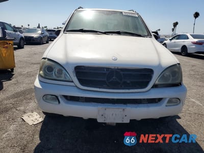 Piąte zdjęcie samochodu w środku: 2002 MERCEDES-BENZ ML 320 VIN:4JGAB54E92A334814 - miniatura