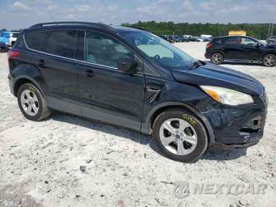 Czwarte zdjęcie samochodu z boku: 2014 FORD ESCAPE SE VIN:1FMCU0GX3EUB27356 - miniatura