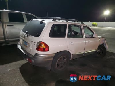 Trzecie zdjęcie samochodu z tyłu: 2002 HYUNDAI SANTA FE GLS VIN:KM8SC13D22U212989 - miniatura