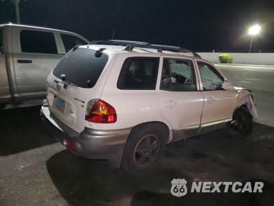 Trzecie zdjęcie samochodu z tyłu: 2002 HYUNDAI SANTA FE GLS VIN:KM8SC13D22U212989 - miniatura