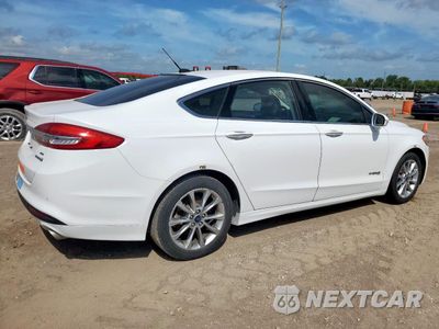 Trzecie zdjęcie samochodu z tyłu: 2017 FORD FUSION SE HYBRID VIN:3FA6P0LU0HR409606 - miniatura