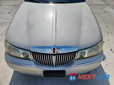 Zdjęcie 11 z 12 samochodu: 1999 LINCOLN TOWN CAR CARTIER VIN:1LNHM83W0XY607285 - miniatura