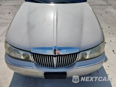 Zdjęcie 11 z 12 samochodu: 1999 LINCOLN TOWN CAR CARTIER VIN:1LNHM83W0XY607285 - miniatura
