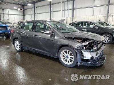 Czwarte zdjęcie samochodu z boku: 2015 FORD FOCUS SE VIN:1FADP3F21FL336521 - miniatura