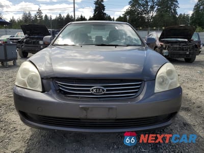 Piąte zdjęcie samochodu w środku: 2007 KIA OPTIMA LX VIN:KNAGE123375109141 - miniatura