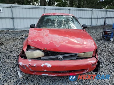 Piąte zdjęcie samochodu w środku: 1995 TOYOTA COROLLA VIN:2T1AE04B9SC077119 - miniatura