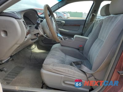 Zdjęcie 7 z 14 samochodu: 2002 CHEVROLET IMPALA VIN:2G1WF52E829144993 - miniatura
