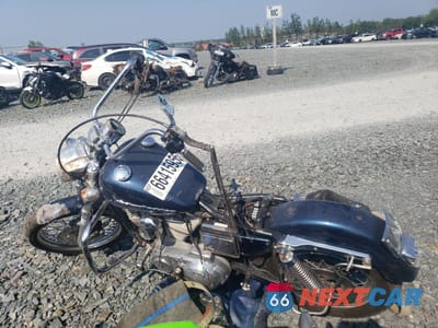 Trzecie zdjęcie samochodu z tyłu: 1995 HARLEY-DAVIDSON XL883 DELUXE VIN:1HD4CFM14SY217889 - miniatura