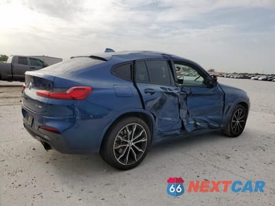 Trzecie zdjęcie samochodu z tyłu: 2021 BMW X4 XDRIVE30I VIN:5UX2V1C0XM9G98390 - miniatura