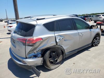 Trzecie zdjęcie samochodu z tyłu: 2018 TOYOTA RAV4 LE VIN:JTMZFREV3JJ210697 - miniatura