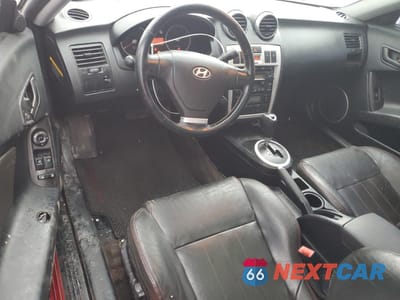 Zdjęcie 8 z 14 samochodu: 2005 HYUNDAI TIBURON GT VIN:KMHHN65F25U164141 - miniatura
