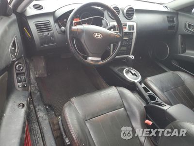 Zdjęcie 8 z 14 samochodu: 2005 HYUNDAI TIBURON GT VIN:KMHHN65F25U164141 - miniatura