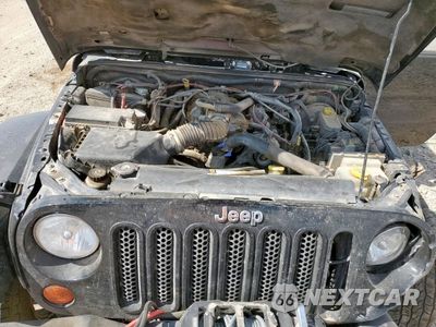 Zdjęcie 11 z 14 samochodu: 2009 JEEP WRANGLER UNLIMITED SAHARA VIN:1J4GA59119L787129 - miniatura