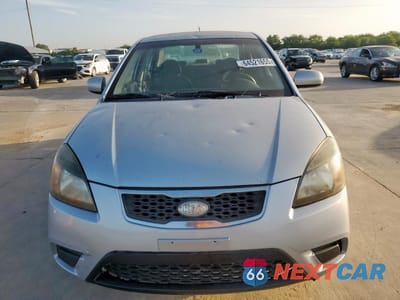 Piąte zdjęcie samochodu w środku: 2010 KIA RIO LX VIN:KNADH4A3XA6673089 - miniatura