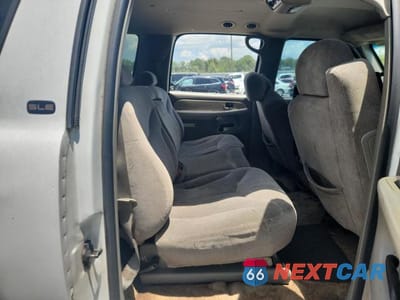 Zdjęcie 11 z 14 samochodu: 2001 GMC YUKON XL C1500 VIN:1GKEC16T11J253736 - miniatura