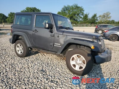 Czwarte zdjęcie samochodu z boku: 2017 JEEP WRANGLER SPORT VIN:1C4AJWAG4HL567726 - miniatura
