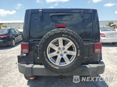 Zdjęcie 6 z 15 samochodu: 2011 JEEP WRANGLER JEEP 70TH ANNIVERSARY VIN:1J4AA7D17BL579254 - miniatura