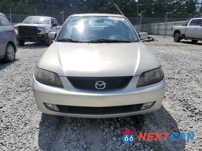 Piąte zdjęcie samochodu w środku: 2002 MAZDA PROTEGE DX VIN:JM1BJ226720635058 - miniatura