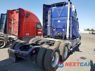 Czwarte zdjęcie samochodu z boku: 2020 VOLVO VNL VIN:4V4NC9EH3LN237822 - miniatura