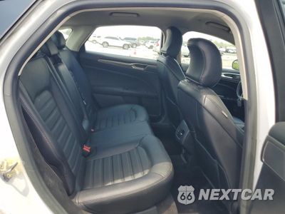 Zdjęcie 10 z 12 samochodu: 2018 FORD FUSION SE HYBRID VIN:3FA6P0LU7JR171940 - miniatura