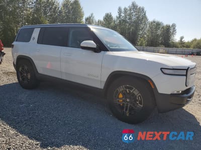 Czwarte zdjęcie samochodu z boku: 2023 RIVIAN R1S ADVENTURE VIN:7PDSGABA9PN015215 - miniatura