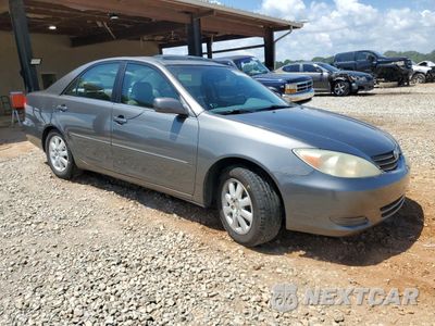 Czwarte zdjęcie samochodu z boku: 2002 TOYOTA CAMRY LE VIN:4T1BF30K72U513151 - miniatura