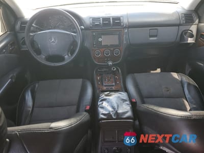 Zdjęcie 8 z 13 samochodu: 2002 MERCEDES-BENZ ML 320 VIN:4JGAB54E92A334814 - miniatura