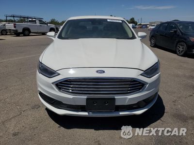 Piąte zdjęcie samochodu w środku: 2018 FORD FUSION SE HYBRID VIN:3FA6P0LU6JR129954 - miniatura