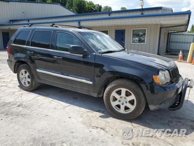 Czwarte zdjęcie samochodu z boku: 2010 JEEP GRAND CHEROKEE LAREDO VIN:1J4PR4GK3AC143733 - miniatura