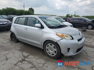 Czwarte zdjęcie samochodu z boku: 2010 TOYOTA SCION XD VIN:JTKKU4B49AJ053286 - miniatura