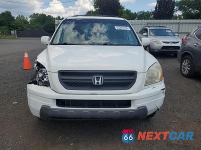 Piąte zdjęcie samochodu w środku: 2005 HONDA PILOT EXL VIN:5FNYF18525B048597 - miniatura