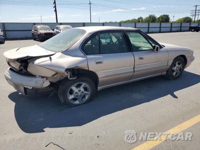 Trzecie zdjęcie samochodu z tyłu: 1999 PONTIAC BONNEVILLE SE VIN:1G2HX52K1XH233699 - miniatura