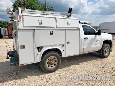 Trzecie zdjęcie samochodu z tyłu: 2015 CHEVROLET SILVERADO C3500 VIN:1GB3CYCG0FZ543062 - miniatura
