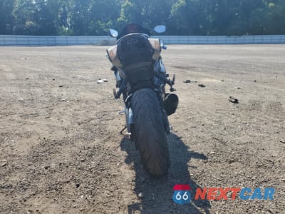 Czwarte zdjęcie samochodu z boku: 2011 SUZUKI GSX750 VIN:JS1GR7MA8B2100817 - miniatura