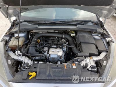 Zdjęcie 12 z 13 samochodu: 2017 FORD FOCUS SE VIN:1FADP3FEXHL307659 - miniatura