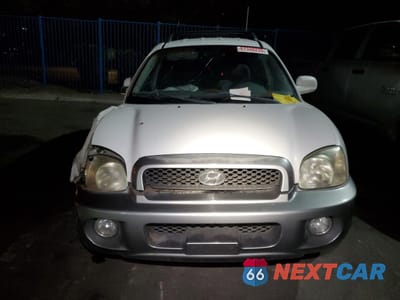 Piąte zdjęcie samochodu w środku: 2002 HYUNDAI SANTA FE GLS VIN:KM8SC13D22U212989 - miniatura