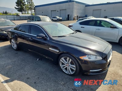 Czwarte zdjęcie samochodu z boku: 2013 JAGUAR XJL PORTFOLIO VIN:SAJWA2GB4DLV42802 - miniatura