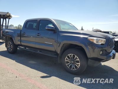 Czwarte zdjęcie samochodu z boku: 2020 TOYOTA TACOMA DOUBLE CAB VIN:3TMBZ5DN5LM026483 - miniatura