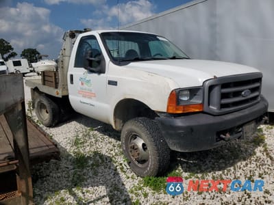 Czwarte zdjęcie samochodu z boku: 2000 FORD SUPER DUTY F-350 W/D VIN:1FDWF37F5YEE28547 - miniatura