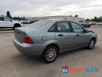 Trzecie zdjęcie samochodu z tyłu: 2005 FORD FOCUS ZX4 VIN:1FAFP34N55W123056 - miniatura