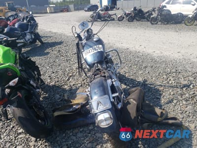 Czwarte zdjęcie samochodu z boku: 1995 HARLEY-DAVIDSON XL883 DELUXE VIN:1HD4CFM14SY217889 - miniatura