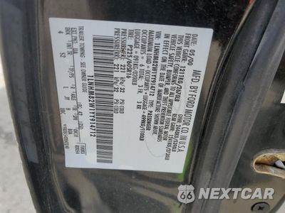 Zdjęcie 12 z 12 samochodu: 2000 LINCOLN TOWN CAR SIGNATURE VIN:1LNHM82W1YY914712 - miniatura