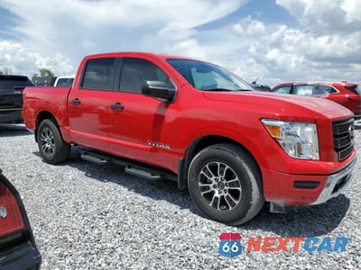 Czwarte zdjęcie samochodu z boku: 2023 NISSAN TITAN SV VIN:1N6AA1EFXPN108818 - miniatura