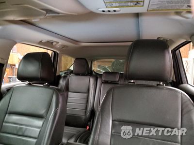 Zdjęcie 10 z 13 samochodu: 2015 FORD ESCAPE TITANIUM VIN:1FMCU9J98FUA47860 - miniatura
