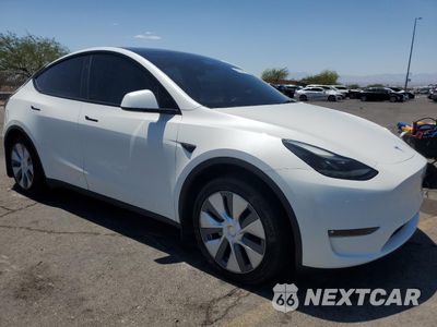 Czwarte zdjęcie samochodu z boku: 2023 TESLA MODEL Y VIN:7SAYGDEE9PF869303 - miniatura