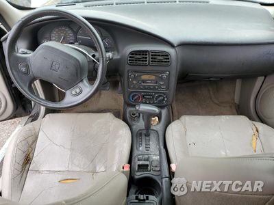 Zdjęcie 8 z 14 samochodu: 2000 SATURN SC2 VIN:1G8ZY1277YZ148504 - miniatura